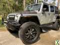 Photo Used 2011 Jeep Wrangler Unlimited Sahara w/ Connectivity Group
