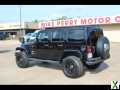 Photo Used 2015 Jeep Wrangler Unlimited Sahara w/ Trailer Tow Group