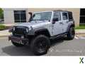 Photo Used 2012 Jeep Wrangler Unlimited Rubicon w/ Dual Top Group