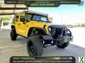 Photo Used 2011 Jeep Wrangler Unlimited Rubicon w/ Dual Top Group