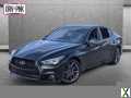Photo Used 2021 INFINITI Q50 Red Sport 400 w/ Carbon Fiber Package