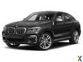 Photo Used 2019 BMW X4 M40i w/ Executive Package