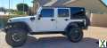 Photo Used 2013 Jeep Wrangler Unlimited Rubicon w/ Connectivity Group