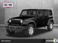 Photo Used 2014 Jeep Wrangler Unlimited Sahara w/ Max Tow Package