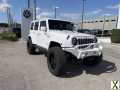 Photo Used 2014 Jeep Wrangler Unlimited Sahara w/ Max Tow Package