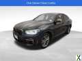 Photo Used 2020 BMW X4 M40i w/ Executive Package