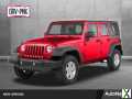 Photo Used 2013 Jeep Wrangler Unlimited Rubicon w/ Connectivity Group