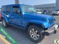 Photo Used 2015 Jeep Wrangler Unlimited Sahara w/ Dual Top Group