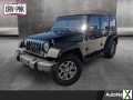 Photo Used 2014 Jeep Wrangler Unlimited Rubicon w/ Connectivity Group