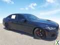 Photo Used 2023 BMW M550i xDrive w/ Dynamic Handling Package