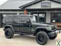 Photo Used 2012 Jeep Wrangler Unlimited Sahara w/ Connectivity Group