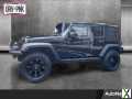 Photo Used 2014 Jeep Wrangler Unlimited Rubicon w/ Connectivity Group