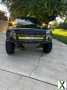 Photo Used 2011 Ford F150 Raptor w/ Raptor Luxury Pkg