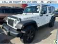 Photo Used 2012 Jeep Wrangler Unlimited Rubicon w/ Connectivity Group