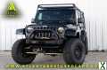 Photo Used 2014 Jeep Wrangler Unlimited Rubicon w/ Connectivity Group