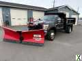 Photo Used 2012 Ford F550 4x4 Regular Cab Super Duty w/ Payload Upgrade Pkg