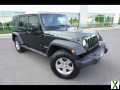 Photo Used 2010 Jeep Wrangler Unlimited Rubicon w/ Dual Top Group