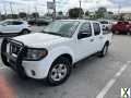 Photo Used 2012 Nissan Frontier SV w/ SV Premium Utility Pkg